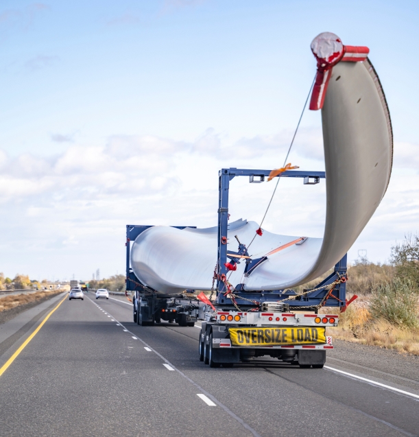 Oversize shipping vehicle on the road