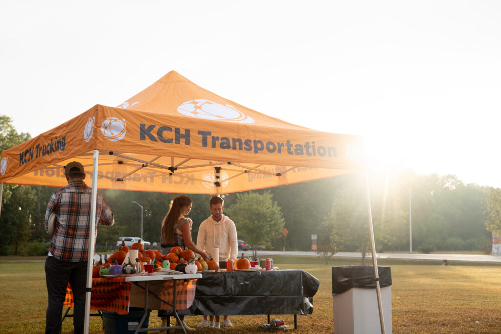 KCH Transportation tent at a festival.